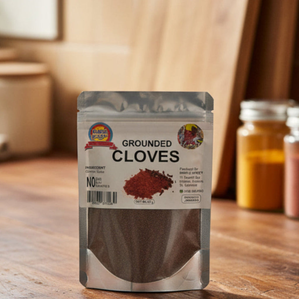 Package of ground cloves with a label on a reflective surface